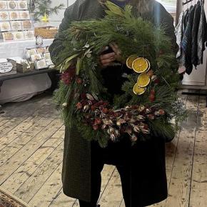 Treats wreath held by designer Brie Soares. Tim Peltzer photo