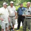 Accepting the Firewise Community Award from Kent Nelson, Maine Forestry Service Ranger, right, are, from left, Curt Norred, the Firewise Community Board president; Glenn Townsend, retiring Boothbay Harbor Fire Chief; and Nick Upham, Asst. Fire Chief.