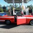 Bruno and Cécile's red, roofless '65 Triumph Vitesse.