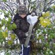 Evan Wells makes sure the family feeders are well stocked for winter visitors. Courtesy of Allison Wells