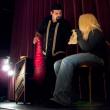 Conjuring Carroll performs a magic trick on stage at the Colonial Theatre with help from Lexi Richard. (Photo by Ethan Andrews)