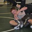 Howard Carter, left, puts Coach Don Waltz into a hold. BEN BULKELEY/Boothbay Register