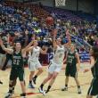 Senior captain Alex Clarke puts up a shot against Waynflete as co-captain Allison Crocker looks on. RYAN LEIGHTON/Boothbay Register