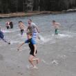 Swimmers race back onto shore following a short dip into the ocean off Hendrick's Head Beach on Southport. BEN BULKELEY/Boothbay Register