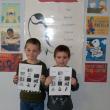 First graders Austin and Forrest hold their Chickadee Award ballots. Courtesy of Wiscasset Primary School