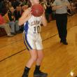 Sarah Caron lines up a three-point shot during a game at BRHS in 2012. KEVIN BURNHAM/Boothbay Register