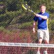 Senior Brady Duncan elevates for this return against Wiscasset's Tom Anderson. KATHY ONORATO/Boothbay Register