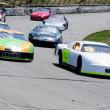 Darrin Ripley, of Appleton, driving the #9 car, is the first to cross the finish line in the Late Model Sportsman feature at Wiscasset Speedway on Saturday, April 27. courtesy of Peter Taylor, Wiscasset Speedway