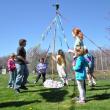 Two groups of Southport students helped wrap colored ribbons during the Pagan tradition of the Maypole. BEN BULKELEY/Boothbay Register