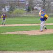 Nate Colcord, right, fires a pitch in the third inning May 15 against the Wiscasset Wolverines as Stephen Barter gets ready (left). Colcord drove in one run, but Wiscasset came away with a 12-2 victory. Below: Wiscasset's Chandler Longfellow fires a pitch. BEN BULKELEY/Boothbay Register