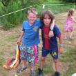 Liam Dun and James Dun Rappaport take a break from the ribbon toss at Volksmarch. RYAN LEIGHTON/Boothbay Register