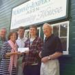 Presenting the donation to the BRSAF in front of the JPVIS Community Center are, from left: Peter Edwards, President of JPVIS; Anne Dooley, Manley Reed Fund centennial representative for JPVIS; Andy Matthews, BRSAF Board Member and JPVIS member; Cade Smith, Recipient of the Manley Reed Scholarship Grant for 2013; and Ham Meserve, President, BRSAF. Courtesy of Peter Edwards