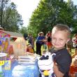 Peter wins a toy barn donated by Big Al’s. Courtesy of Wiscasset Public Library