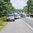 Lincoln County Sheriff’s Office directs traffic near Montsweag Flea Market on Route 1 Wednesday following a car chase. Two people suspected of a Knox County home robbery were arrested by Lincoln County Sheriff’s Office. BEN BULKELEY/Boothbay Register