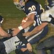 Seahawk fullback Gabe Purin busts through the Traip defense for some rushing yardage during Friday night’s game at Sherman Field. KEVIN BURNHAM/Boothbay Register