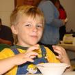 Mason Higgins, 4, of Wiscasset, son of Wiscasset Ambulance Service employees Katie and Steve Higgins, enjoys some chili at a cookoff the Wiscasset Ambulance Attendants Association held September 21. SUSAN JOHNS/Wiscasset Newspaper