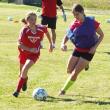 Sophomore Lisa Pawlowski (right) tracks down the ball against middle school player Ella Spear during a preseason scrimmage. RYAN LEIGHTON/ Boothbay Register 