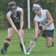 Senior co-captain Tori Schmid battles a Hall-Dale player for the ball during Friday’s game at Perkins Field. KEVIN BURNHAM/Boothbay Register