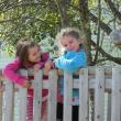 Charlotte Bickford and LeeAnne Lord stop playtime to pose at Sheepcot Valley Children's House. RYAN LEIGHTON/Boothbay Register