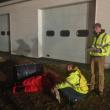 Emergency workers check on a “victim” of a bus-truck collision during a November 7 disaster drill on Route 27 in Wiscasset. SUSAN JOHNS/Wiscasset Newspaper