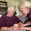 Caregiver Kim Greene-Labranche interacts with Ginny Cardner at her home in Gorham.