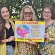 Patrisha McLean, CEO and Founder of Finding Our Voices, center, flanked by the nonprofit’s Chief of Staff Mary Kamradt (right), Patrisha’s daughter and FOV volunteer Jackie McLean Strack. Jackie is featured in the group’s poster campaign referencing abuse by her father. She also provides the music for Patrisha’s Podcast “Let’s Talk About It.”  Finding Our Voices photo