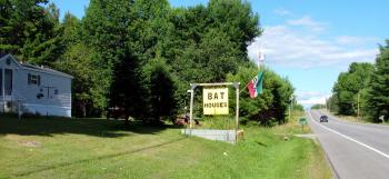 One of several prominent signs in front of Adrian Turner's Route 3 residence advertising his homemade bat houses