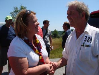 Richard Jordan, new owner of the Wiscasset Raceway, shakes hand with Wiscasset Town Manager Laurie Smith. SUSAN JOHNS/Wiscasset Newspaper