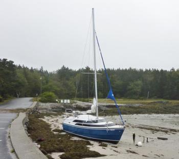 Gene Eves' sailboat on Hendricks Head beach on Southport after the September 19 storm washed it ashore. Courtesy of Gene Eves