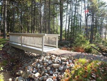 The entrance to the waterfront trail that runs along the Damariscotta River on Bigelow’s East Boothbay campus. The trails will be accessible to the public after the construction is complete. RYAN LEIGHTON/Boothbay Register