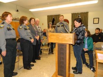 Two Bridges Regional Jail volunteers receive the Spirit of America Tribute from the town of Wiscasset. Left to right, Program Officers Susan Sutter, Heidi Grover, volunteers LaVonne Carey, Ron Carey, Lucy Smith, Major Mark Anderson and Selectman Pam Dunning. CHARLOTTE BOYNTON/Wiscasset Newspaper