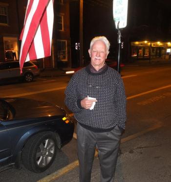 Bruce MacDonald outside the Lincoln Country Democrat headquarters in Damariscotta. MacDonald continually checked for updates throughout the night. RYAN LEIGHTON/Boothbay Register   