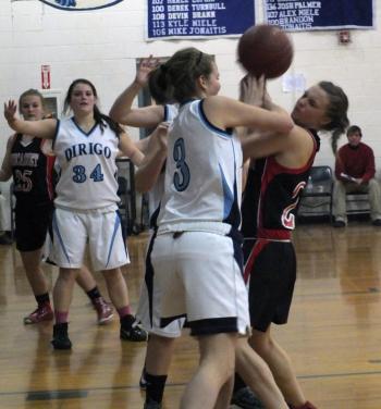 Wiscasset's Heidi Pinkham battles for possession with Dirigo’s Rachel Knight. KATHY ONORATO/Wiscasset Newspaper