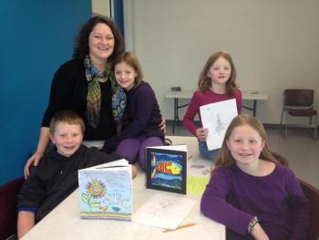 Eason's children, from left, Alex, 11; twins Mia and Callan, seven, Zoë, nine, and Carrie above in the upstairs Community Room where classes will be held. LISA KRISTOFF/Boothbay Register