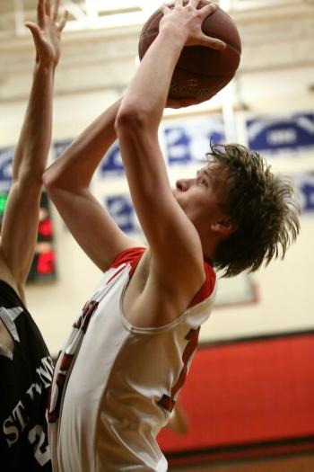 Travis Padilla gets a shot inside in Wiscasset’s win over St. Dom’s in the preliminary round of the Western Maine Class C tournament. Courtesy of Brion Controvillas