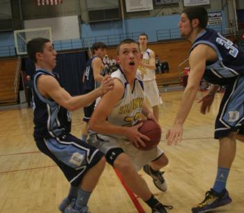 ABOVE: Andrew Hallinan drives to the basket against Dirigo Thursday night at the Augusta Civic Center. MIDDLE: Not backing down, Dirigo's Hunter Ross jumps on John Hepburn's back after Hepburn faked a shot. A foul was called on the play. BOTTOM: Anthony DiMauro works hard to get a shot. KEVIN BURNHAM/Boothbay Register