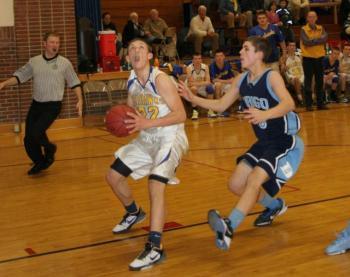 Andrew Hallinan looks to score against Dirgo's Riley Robison. KEVIN BURNHAM/ Boothbay Register