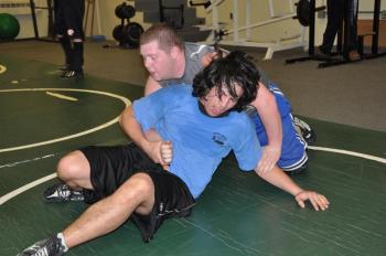 Boothbay Region High School's Antonio Maulolo, front, tries to get out of a hold during a February 11 wrestling practice at Lincoln Academy. BEN BULKELEY/Boothbay Register