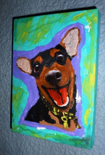 This happy pup was the very first painting Tabetha completed. It currently hangs in her studio. KATRINA CLARK/Boothbay Register