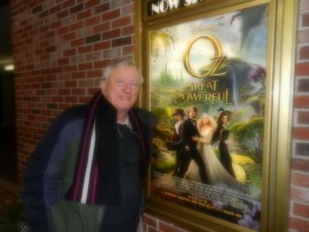 Hamilton Meserve stops outside The Harbor Theatre before viewing the film, “Oz The Great and Powerful.”