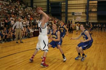 Andrew Hallinan, Anthony DiMauro and Nick Kilgus pressure Trevor Lyford in the fourth quarter. KEVIN BURNHAM/Boothbay Register