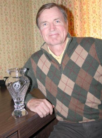 LOWELL WATSON with his 2012 Senior Player of the Year Award presented by the Maine State Golf Association. KEVIN BURNHAM/Boothbay Register