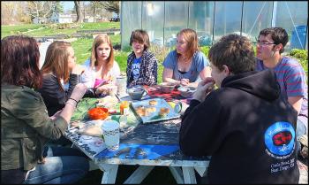 Oceanside students enjoy a break with homemade bagels.