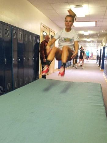 Morgan Crocker practices the long jump in the “all weather training facility” on the second floor of BRHS. RYAN LEIGHTON/Boothbay Register