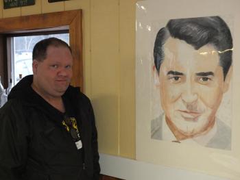 Wiscasset artist Tom Jones displays his portrait of Cary Grant at Miss Wiscasset Diner. JOHN MAGUIRE/Wiscasset Newspaper