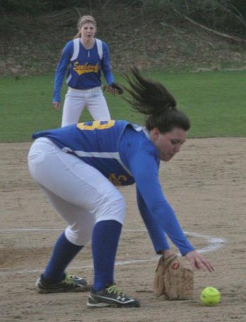 Allison Crocker reaches for the ball before throwing out a Carrabec runner in the third inning of Monday's game at Perkins Field. KEVIN BURNHAM/Boothbay Register 