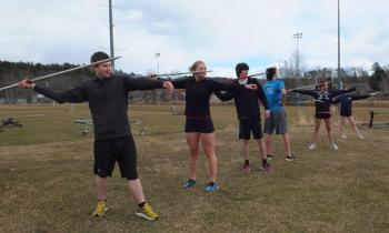 Javelin throwers poised to throw spears during track and field practice at Boothbay Region High School April 2. RYAN LEIGHTON/Staff Reporter