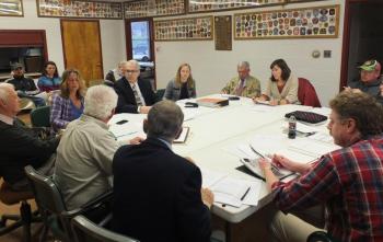 Members of the Wiscasset and RSU 12 withdrawal committees meet April 18 to discuss a draft agreement. JOHN MAGUIRE/Wiscasset Newspaper