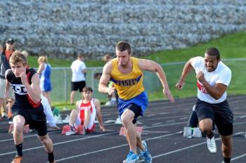 Jason Maddocks charges on in the 100 meter dash. Courtesy of Aquilino Alamo