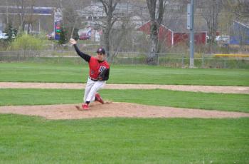 Chandler Longfellow fires a pitch against the Boothbay Region High School Seahawks. Longfellow pitched four innings and allowed one run on four hits while fanning six. BEN BULKELEY/Wiscasset Newspaper   